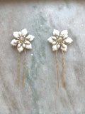 HORQUILLAS FLOR ESMALTADA BLANCA